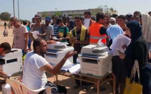 Refugees being helped with English