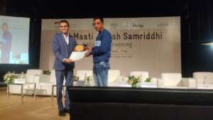 Gour receives his award on World Soil Day