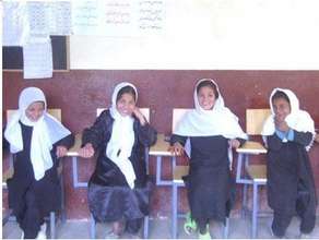 Girls from different ethnic groups share a laugh t