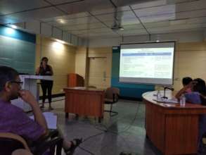 Core group member making a presentation
