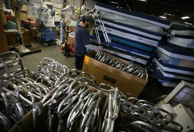 Global Staff readying walkers for shipment