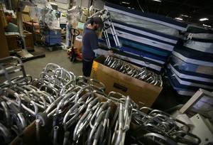 Global Staff readying walkers for shipment