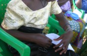 Give a birth kit to a teenage mother in Uganda