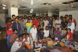 Volunteers at the end of a day of sorting& packing