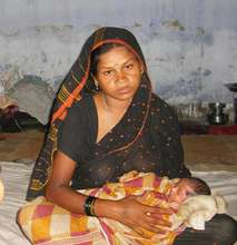 New mother poses with her baby