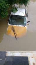 Rent Vehicle submerged in flood