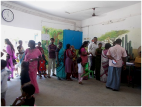Parents standing in a queue for registration