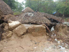 Thatched houses devastated by floods
