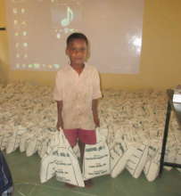 Orphan boy gives helping hand to transport relief