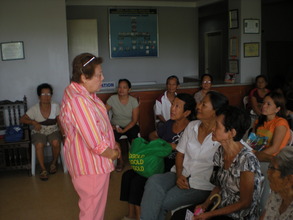 Mrs. Joan A. Datu with patients