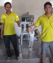 The technicians showing us the prosthetic