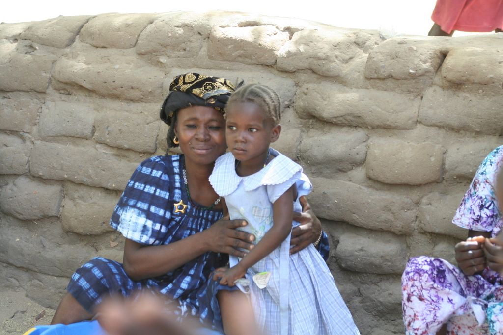 A mother embraces her daughter in Mali