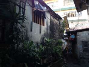 A typical alley in an urban slum in Metro Manila.