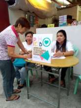 Homeowner signing up for info session on loans