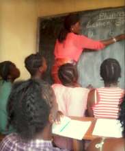 Stage 1 pupils in Makeni learning letter sounds