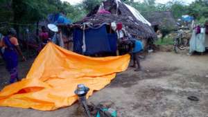 Tarpaulin to cover damaged huts