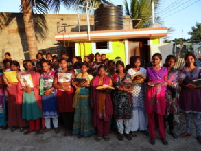 Girls with relief materials