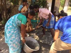 Everyone gets involved in concrete mixing