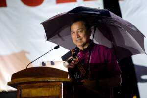 the university president with his umbrella