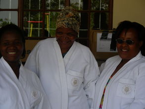 Volunteers receive towelling robes as gifts