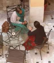 Ms. Mehta with a client