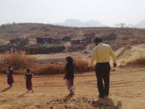 Walking from the informal school to their home