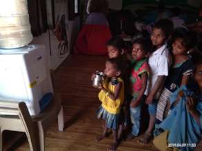 Lining up to taste fresh water for the 1st time