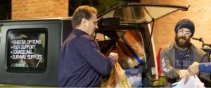 George Witter organizing supplies distribution