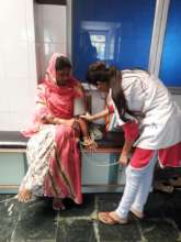 Guddi  attending a Health Check up
