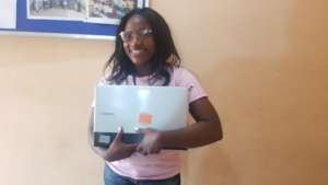Dorcas with her new laptop