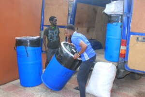 Drums of school supplies arriving in Freetown