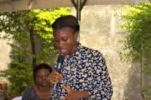 Haja speaking during the debate