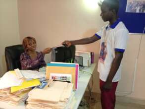 Student Giving Report Card to DASL Office