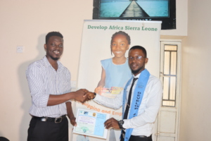 Yusif receiving certificate of completion