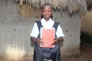 Ibrahim with his new school supplies
