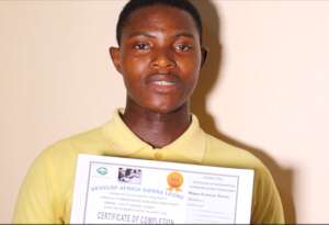 Mohamed with his Computer Training Certificate