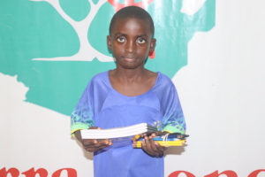 Suliaman with his new school supplies