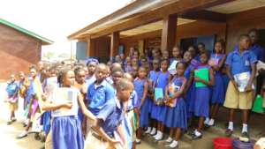 More kids outside the school - full of potential