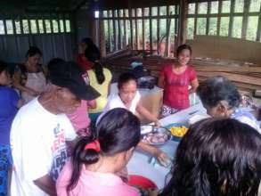 School parents lunch cooking team with clean water