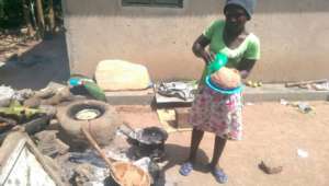 care taker prepares local meal
