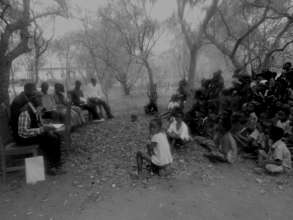Community meeting with Boniface
