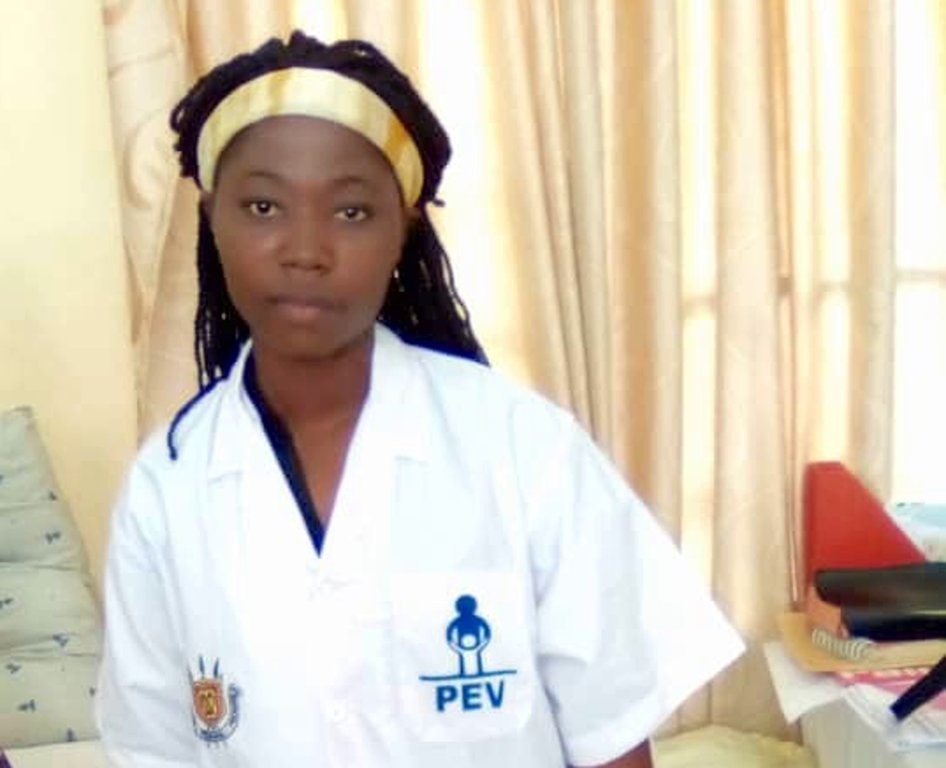 Claudine wearing nurse's uniform