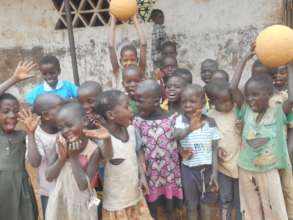 Kids cheer after a Sport for Peace tournament