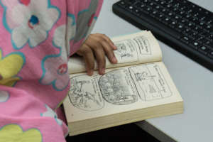 Child at WAO reading