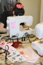 The course on sewing for minor unwed mothers