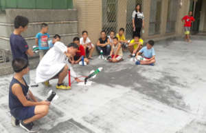 Older children learned to make water rockets.