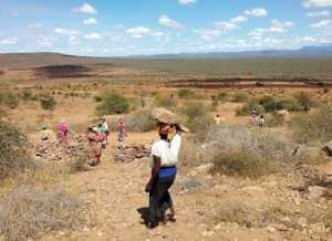 Mkamenyi parents collecting materials