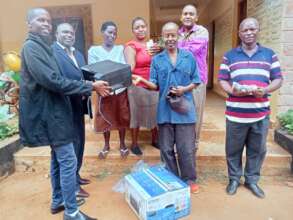 Makwasinyi staff receive a printer paid for by AP