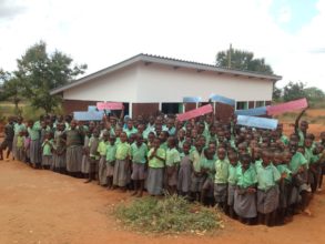 Pupils at Kiteghe celebrate their new toilets