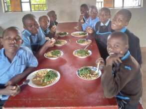 Pupils enjoy school-grown greens with their lunch